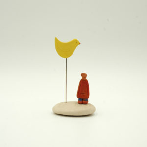 Ceramic figure with bird
