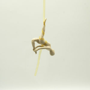 Aerial acrobat with yellow ribbon