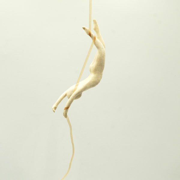 Aerial acrobat with yellow ribbon