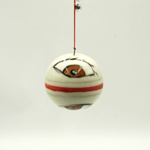 Ceramic sphere with eye decoration