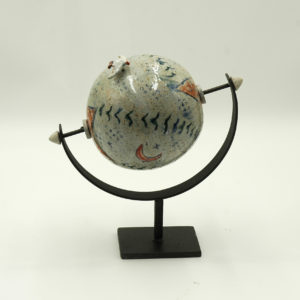 Ceramic globe on metal base