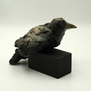 Ceramic raven sculpture