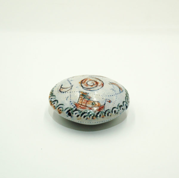Decorative ceramic rattle paperweight