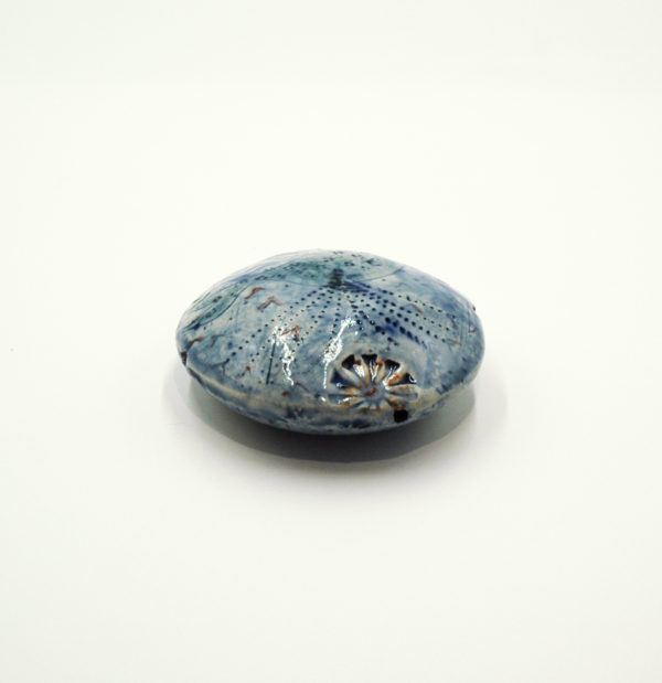 Ceramic rattle paperweight with seascape decoration