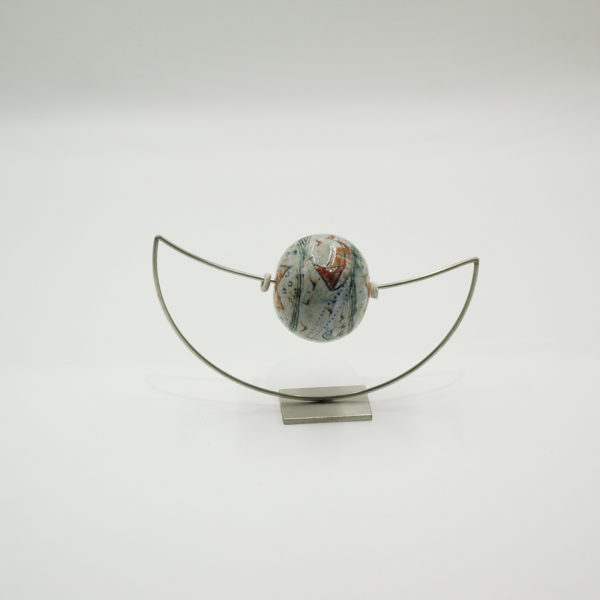 Ceramic globe on a metal base