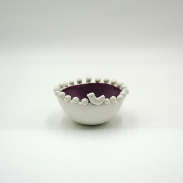 White purple bowl with a bird