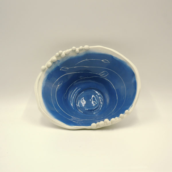 White blue bowl with leaves decoration