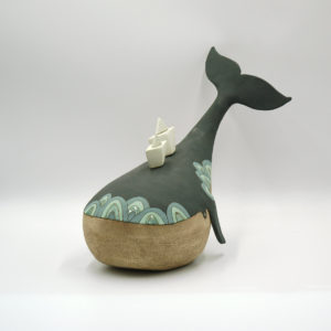 Ceramic whale with small ships